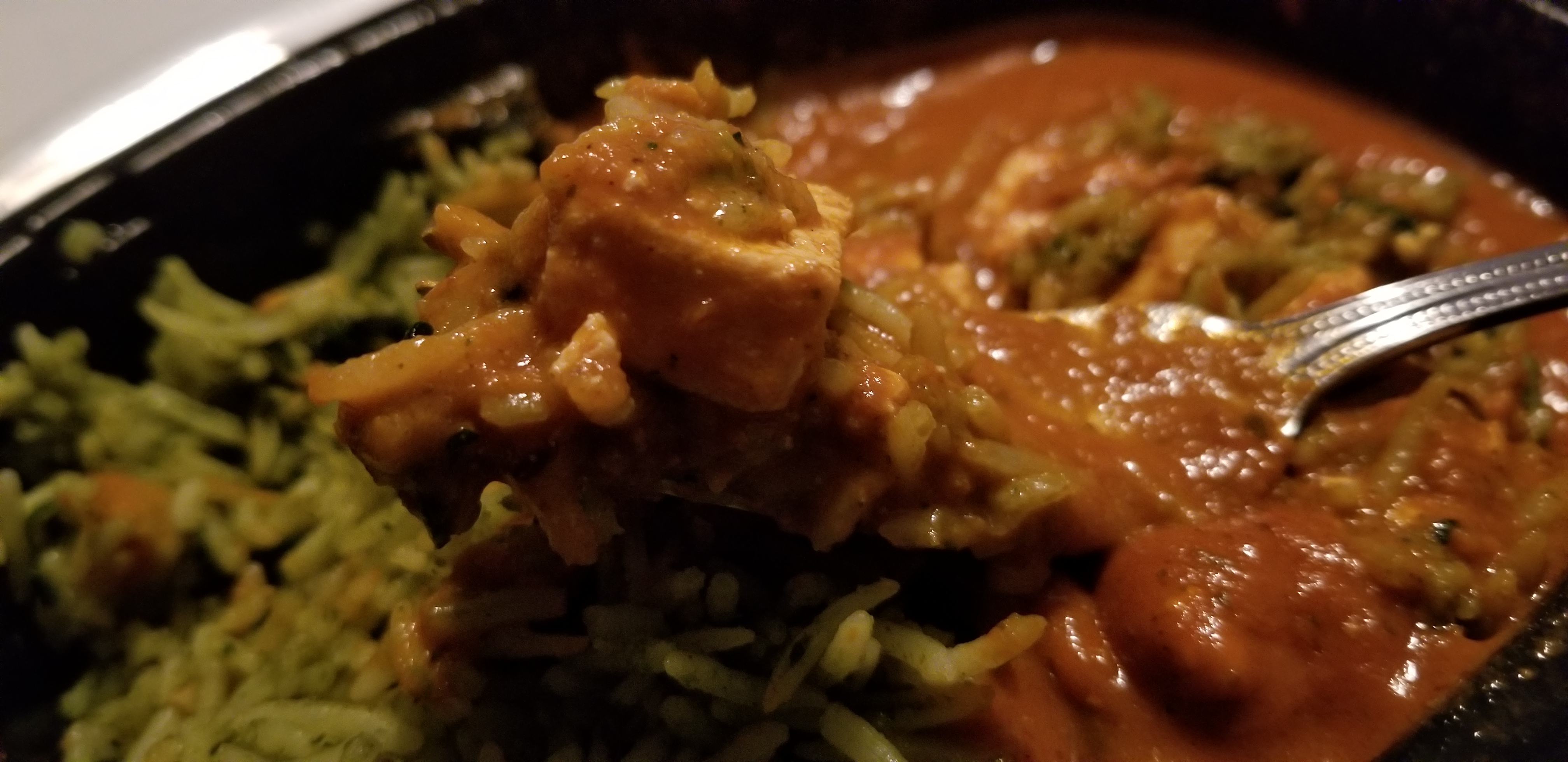 Trader Joe's Tikka Masala with Spinach Basmati Rice Cooked on Fork Up-Close