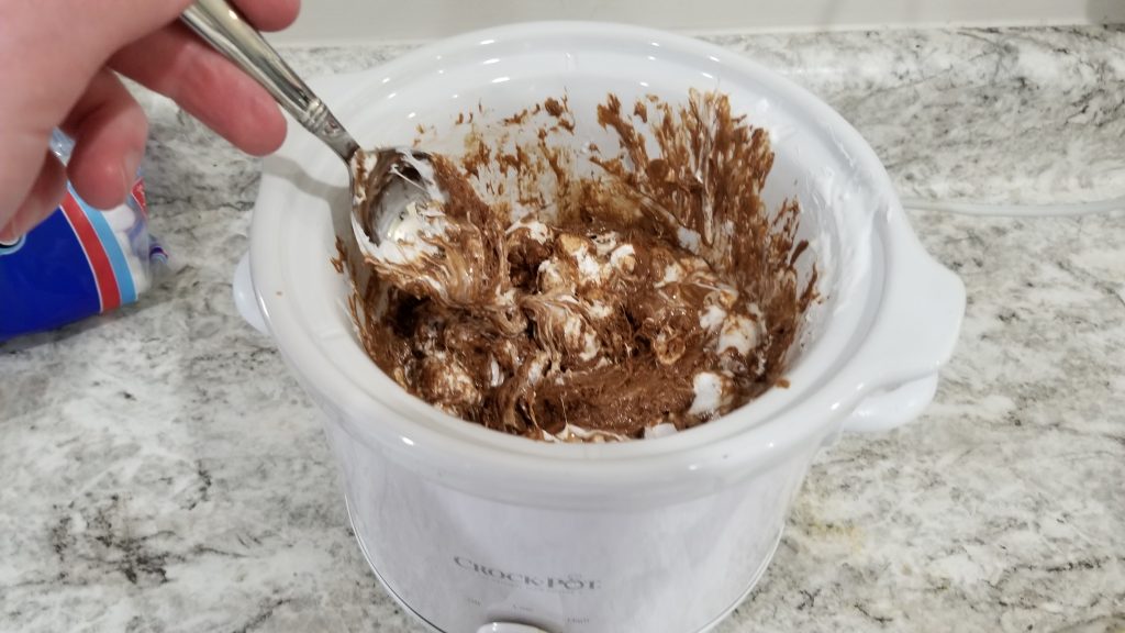 mixing chocolate and marshmallows