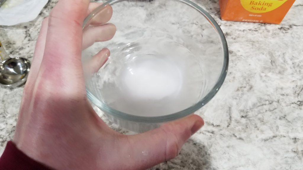 dissolving baking soda in hot water