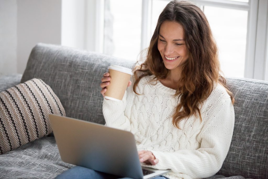 woman on laptop with coffee