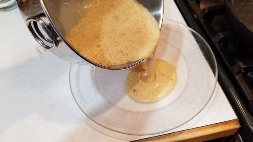 mixture being dumped on a plate for french toast recipe