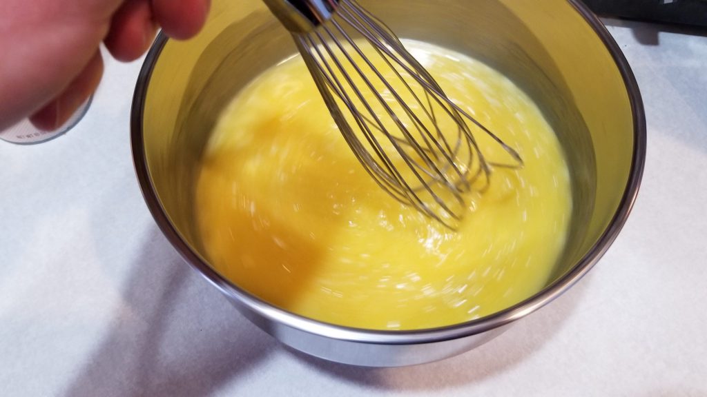 sugar butter and eggs being mixed sugar cookie recipe