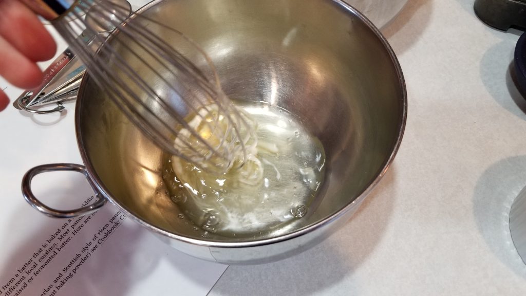mixing egg whites for pancake recipe