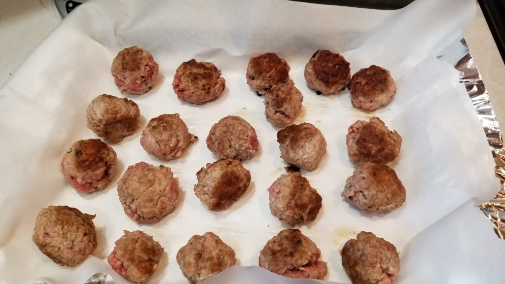 baking sheet with meatballs