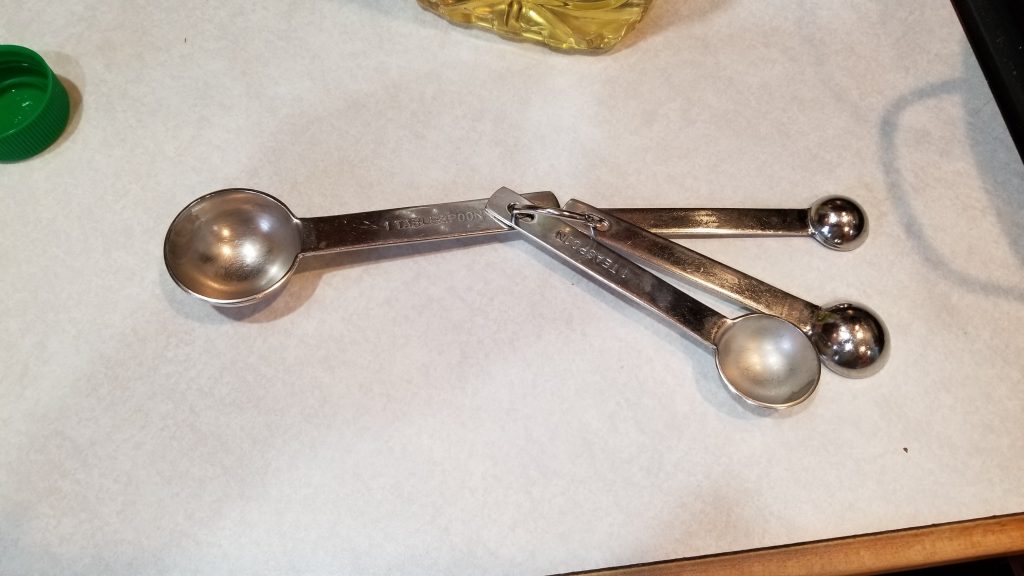 measuring spoons in fried rice recipe