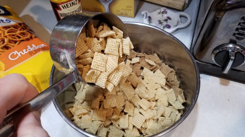 pouring Chex into bowl