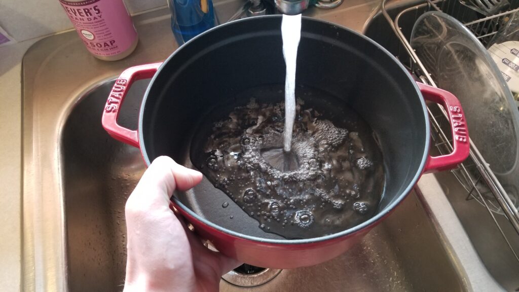 filling a pot of water