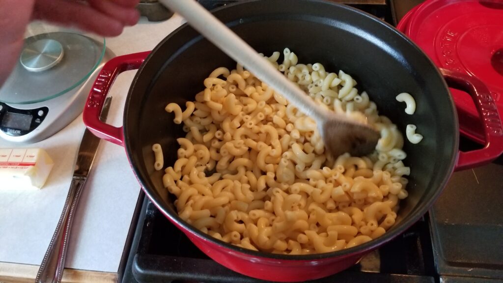 mixing a mac and cheese recipe