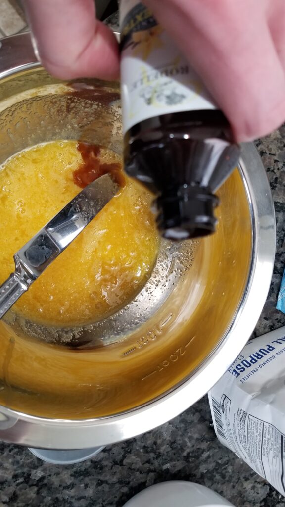 pouring vanilla extract