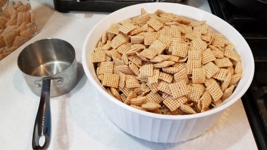 rice squares in bowl for puppy chow recipe