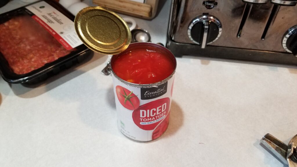 open can of tomatoes