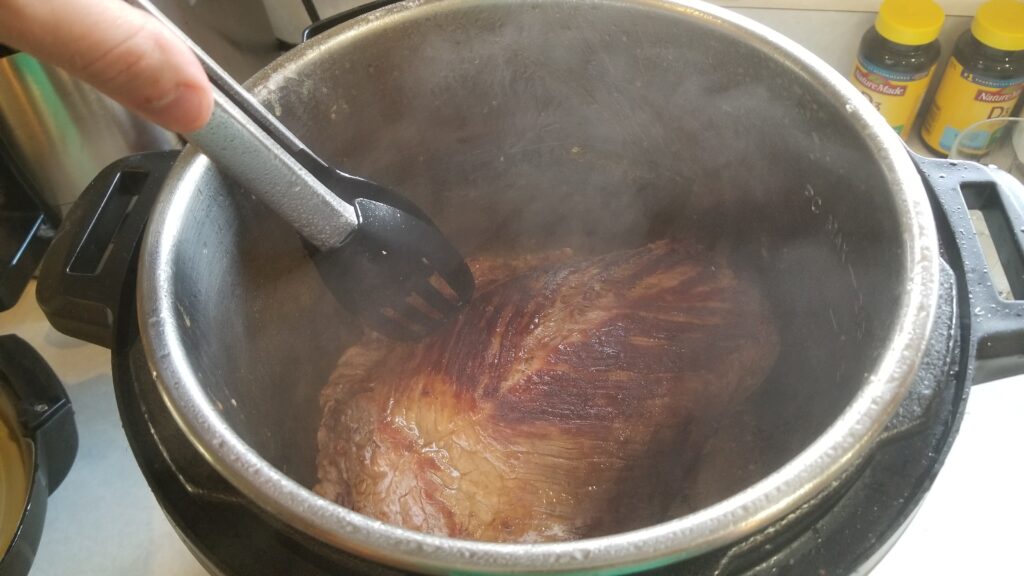 Mississippi pot roast meat cooking