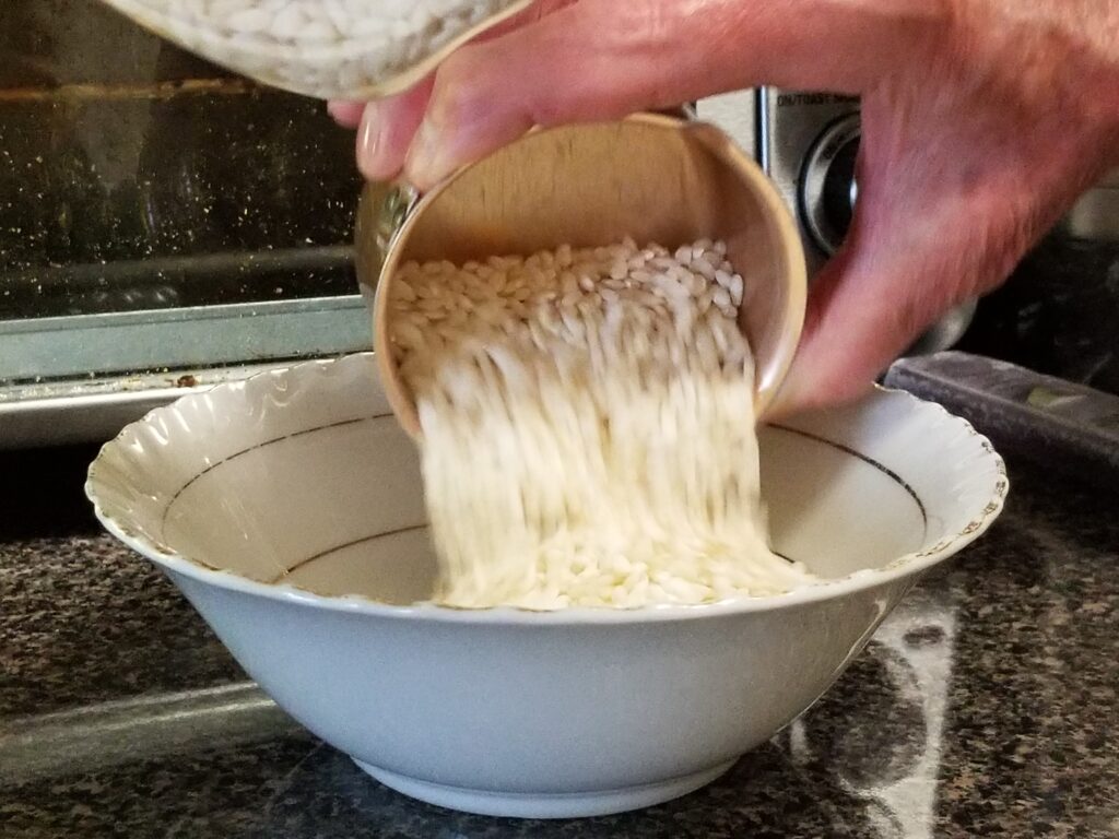pouring out arborio rice