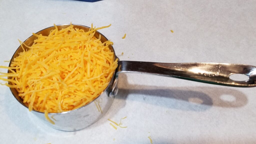 sharp cheddar in 1 cup
