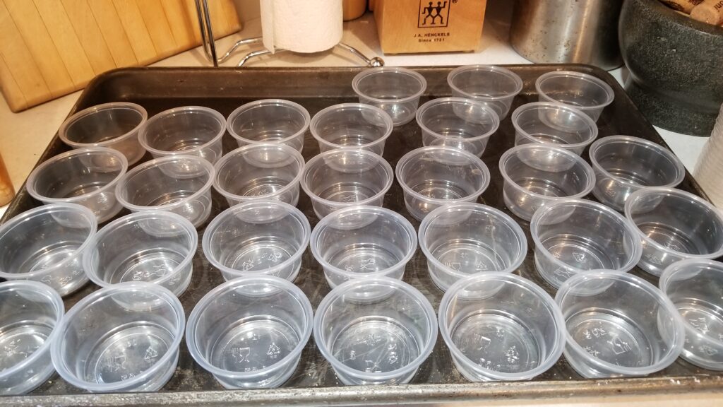 baking sheet with shot cups on it
