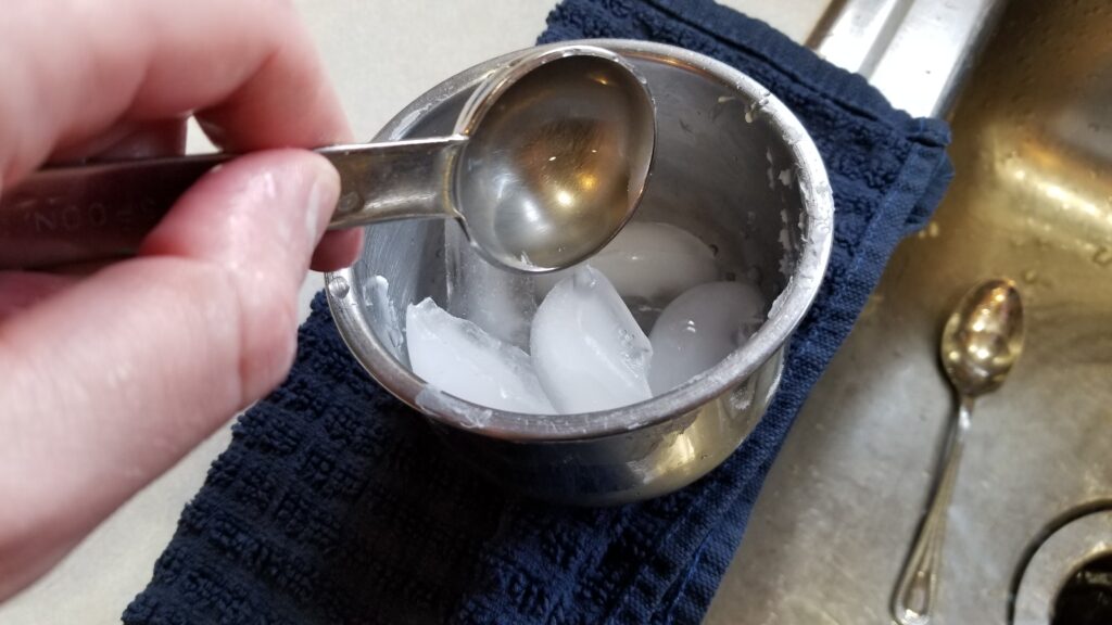 5 tablespoons of water in bowl