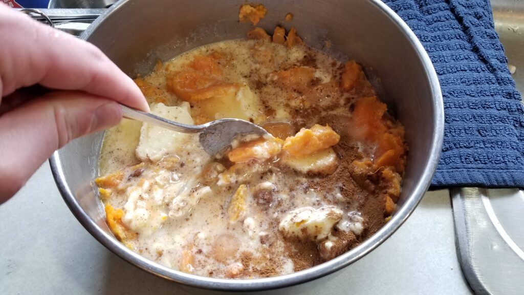 mixing sweet potato pie filling
