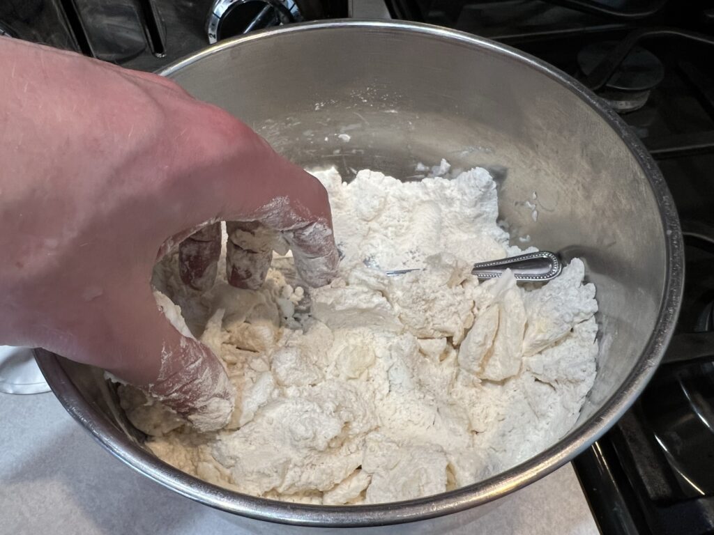 mixing dough for pie crust
