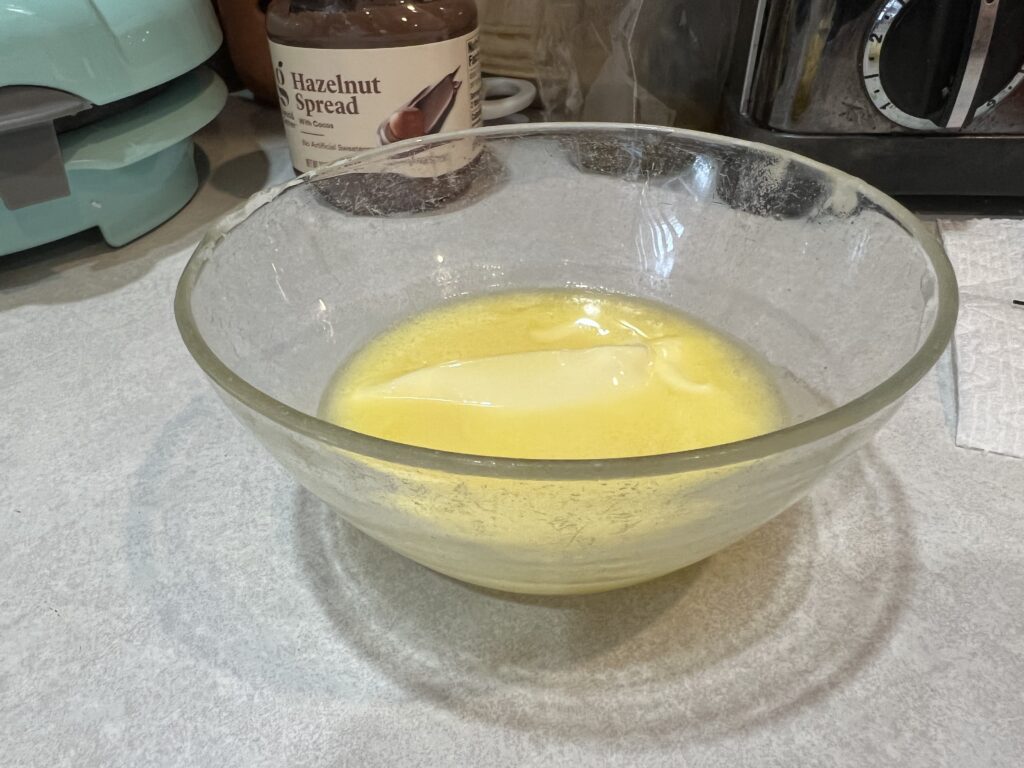 melted butter in a bowl for wafer cookies