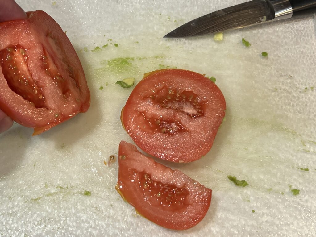 cutting tomatoes for Gemelli pasta